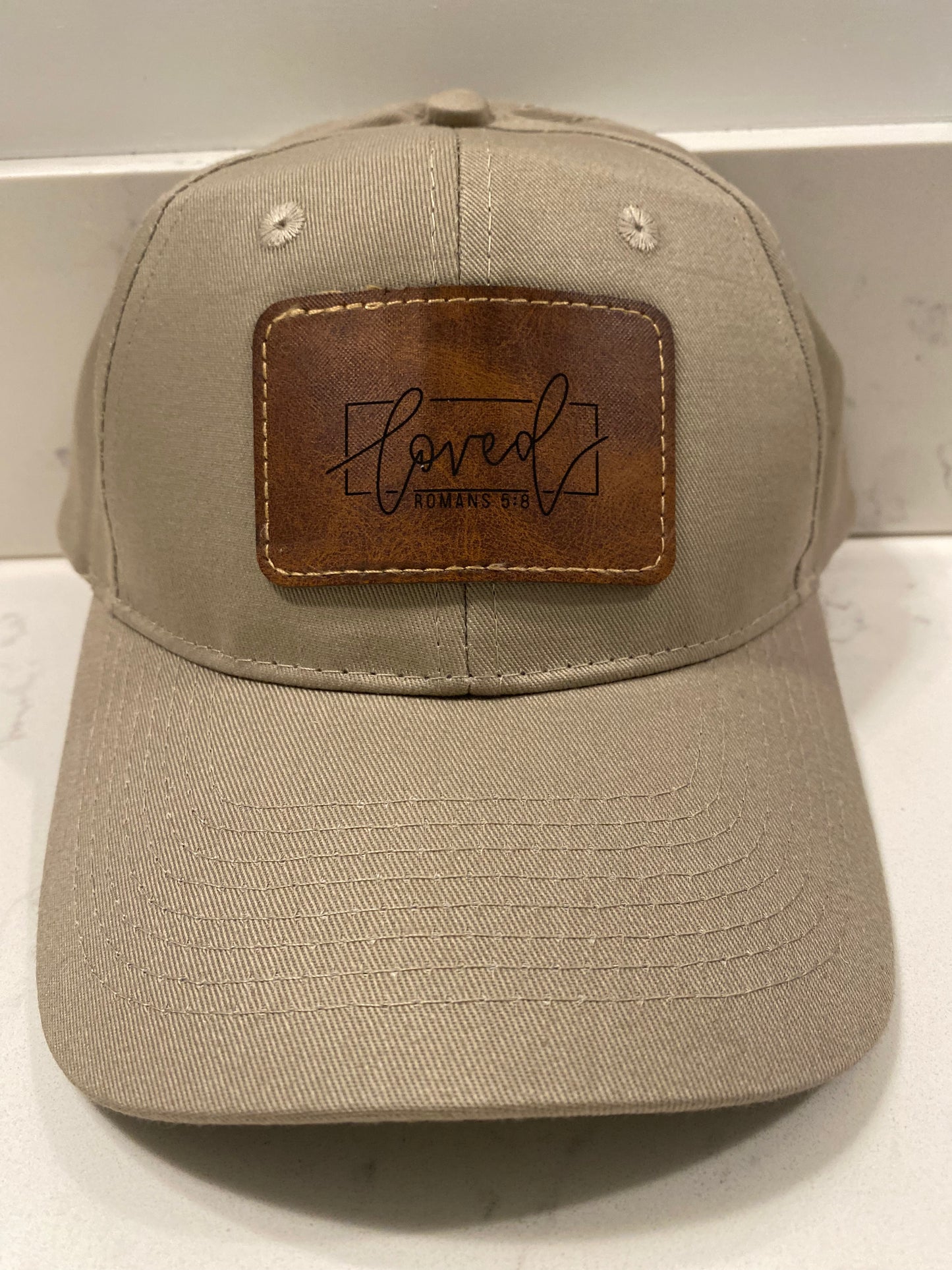 Loved Romans 5:8 Hat